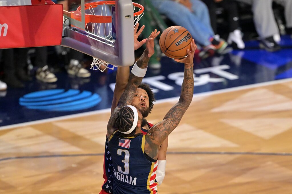 Feb 15, 2026; Inglewood, California, USA; Team USA Stars guard Cade Cunningham (2) of the Detroit Pistons defends against Team USA Stripes forward Brandon Ingram (3) of the Toronto Raptors in game two during the 75th NBA All Star Game at Intuit Dome. Mandatory Credit: Jayne Kamin-Oncea-Imagn Images