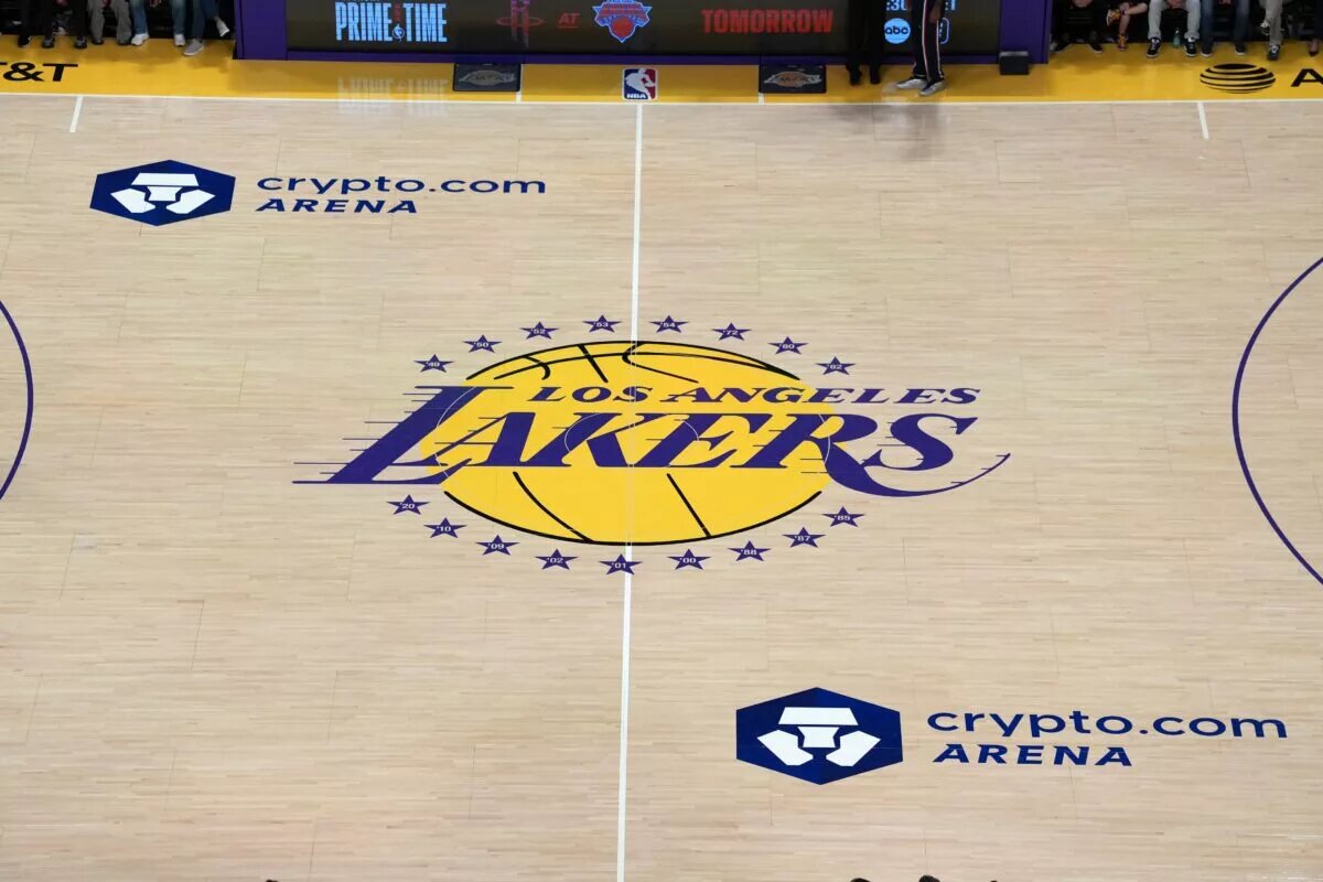 Feb 20, 2026; Los Angeles, California, USA; The Los Angeles Lakers logo at midcourt at Crypto.com Arena. Mandatory Credit: Kirby Lee-Imagn Images