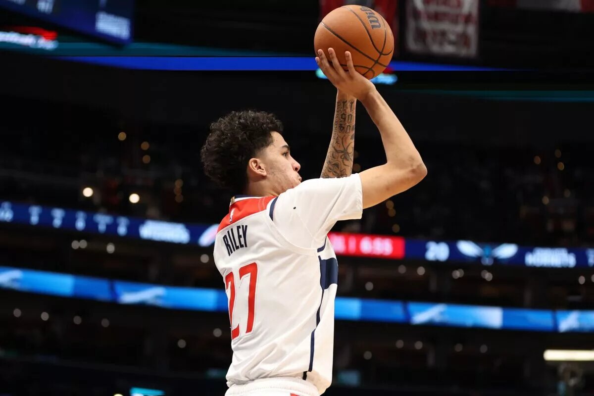 Washington Wizards guard Will Riley (27) takes a shot during the first half against the Charlotte Hornets at Capital One Arena.