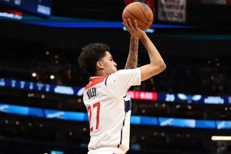 Washington Wizards guard Will Riley (27) takes a shot during the first half against the Charlotte Hornets at Capital One Arena.