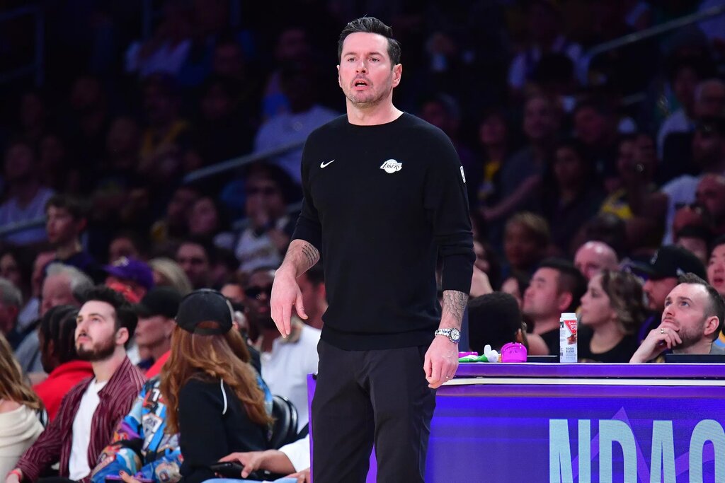 Feb 22, 2026; Los Angeles, California, USA; Los Angeles Lakers head coach JJ Redick watches game action against the Boston Celtics during the first half at Crypto.com Arena. Mandatory Credit: Gary A. Vasquez-Imagn Images