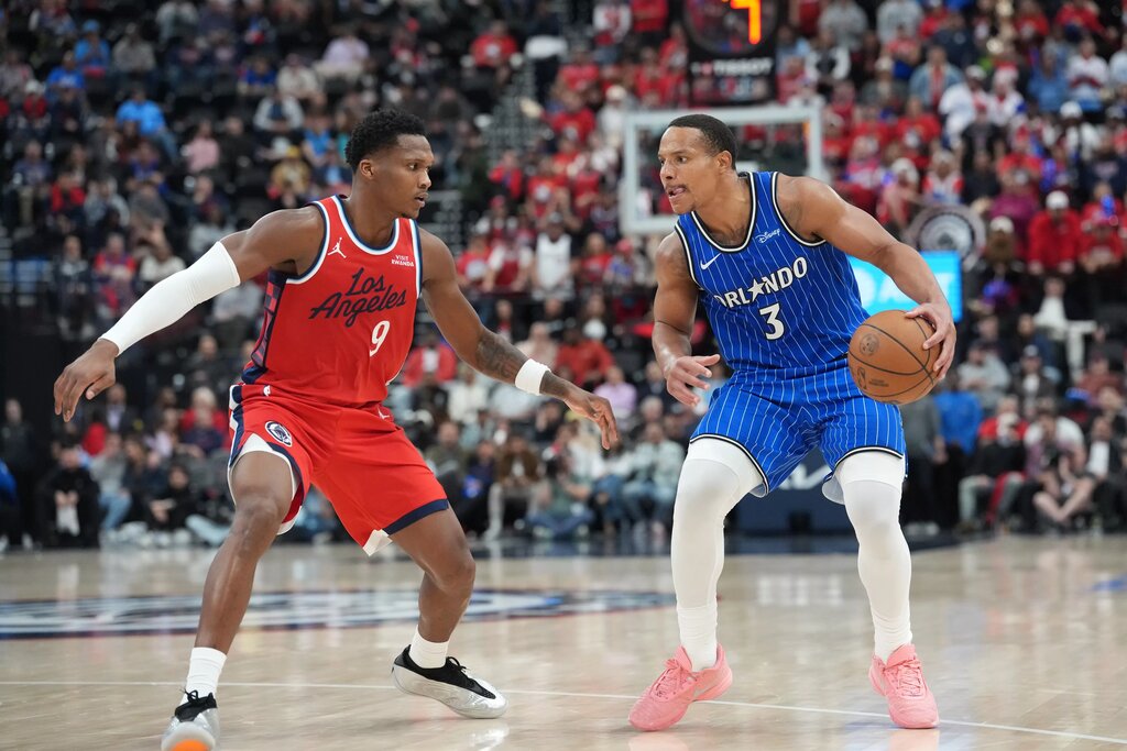  Orlando Magic guard Desmond Bane (3) dribbles the ball against LA Clippers guard Bennedict Mathurin (9) in the second half at Intuit Dome.