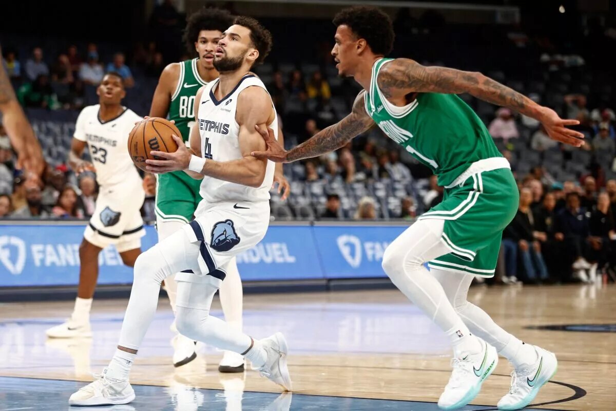 Tyler Burton made his NBA debut vs. the Dallas Mavericks after signing a deal with the Memphis Grizzlies earlier in the day.