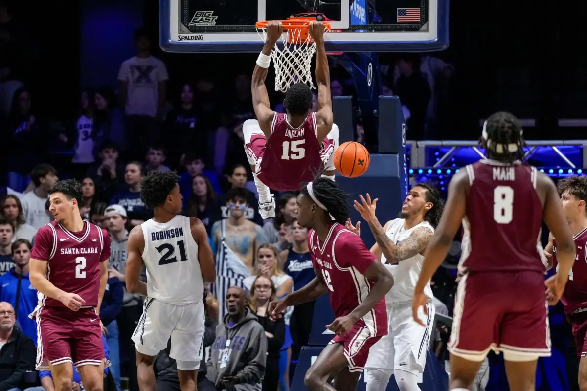 Santa Clara Broncos guard Thierry Darlan (15) dunks in the second half of the NCAA Men’s Basketball game between the Xavier Musketeers and the Santa Clara Broncos at the Cintas Center in Cincinnati on Monday, Nov. 10, 2025. Xavier lost 87-68. © Sam Greene/The Enquirer / USA TODAY NETWORK via Imagn Images