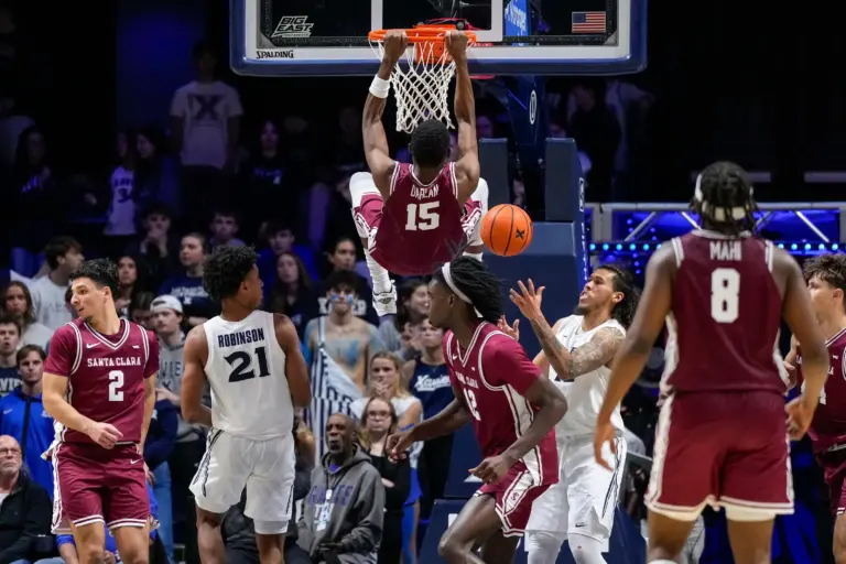Santa Clara Broncos guard Thierry Darlan (15) dunks in the second half of the NCAA Men’s Basketball game between the Xavier Musketeers and the Santa Clara Broncos at the Cintas Center in Cincinnati on Monday, Nov. 10, 2025. Xavier lost 87-68. © Sam Greene/The Enquirer / USA TODAY NETWORK via Imagn Images