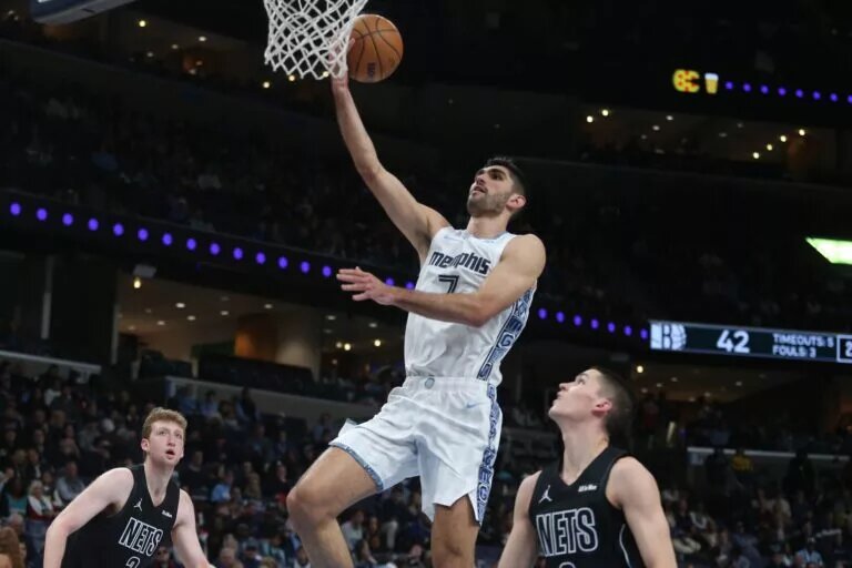 Jan 11, 2026; Memphis, Tennessee, USA; Memphis Grizzlies forward Santi Aldama (7) shoots during the second quarter against the Brooklyn Nets at FedExForum. Mandatory Credit: Petre Thomas-Imagn Images