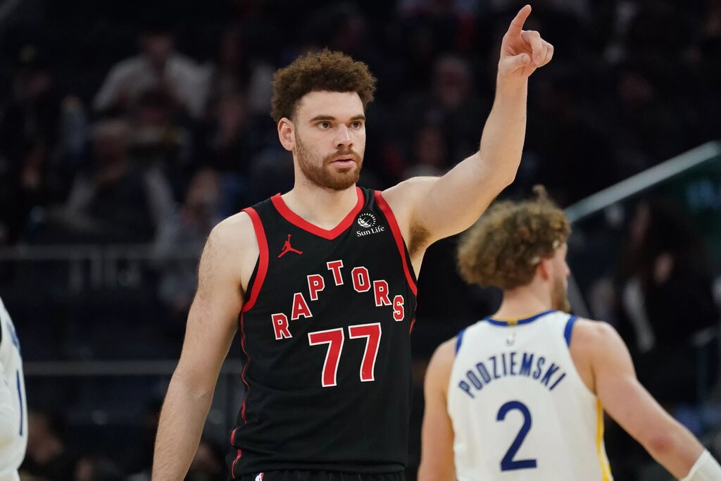  Toronto Raptors forward Jamison Battle (77) motions to a teammate during a game against the Golden State Warriors in the third quarter at Chase Center.