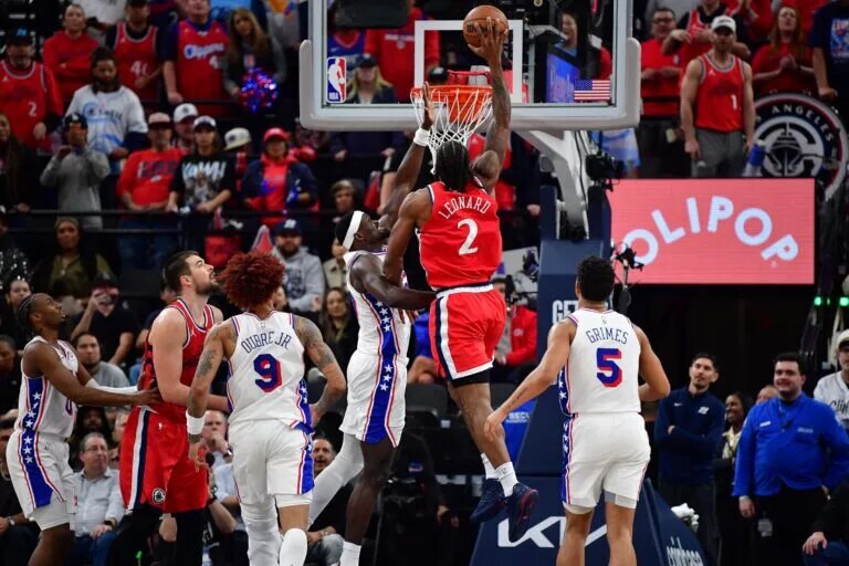 Los Angeles Clippers forward Kawhi Leonard (2) dunks for the basket against Philadelphia 76ers center Adem Bona (30) during the second half