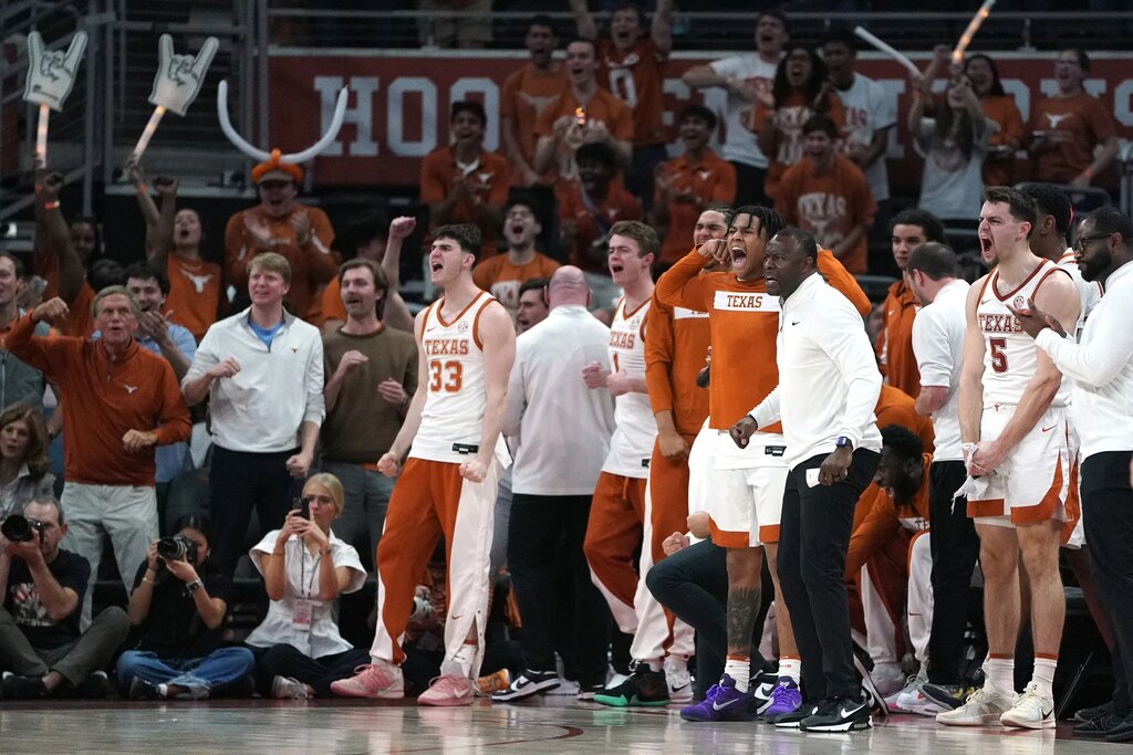 Feb 7, 2026; Austin, Texas, USA; The Texas Longhorns bench reacts to a basket during the second half against the Mississippi Rebels at Moody Center. Mandatory Credit: Dustin Safranek-Imagn Images
