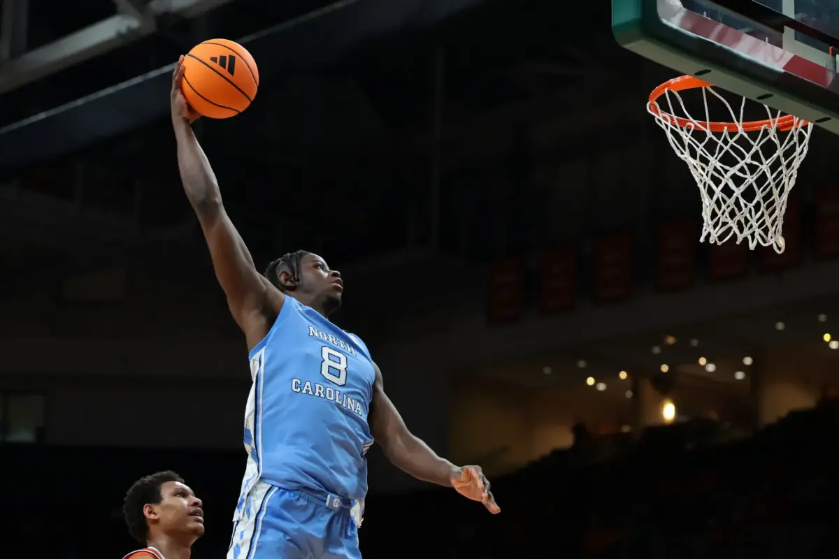 North Carolina Tar Heels forward Caleb Wilson (8) dunks against the Miami Hurricanes during the second half at Watsco Center.
