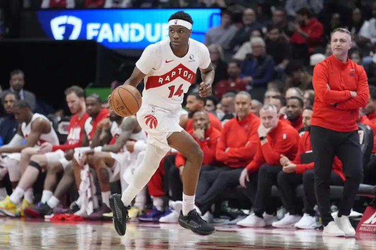 Feb 11, 2026; Toronto, Ontario, CAN; Toronto Raptors guard Ja'Kobe Walter (14) dribbles up the court against the Detroit Pistons during the second half at Scotiabank Arena. Mandatory Credit: John E. Sokolowski-Imagn Images