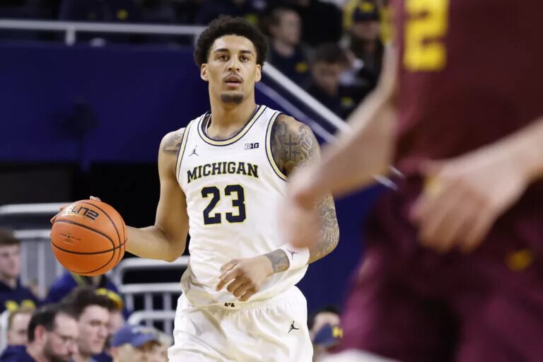 Yaxel Lendeborg dribbles the ball down the court for Michigan