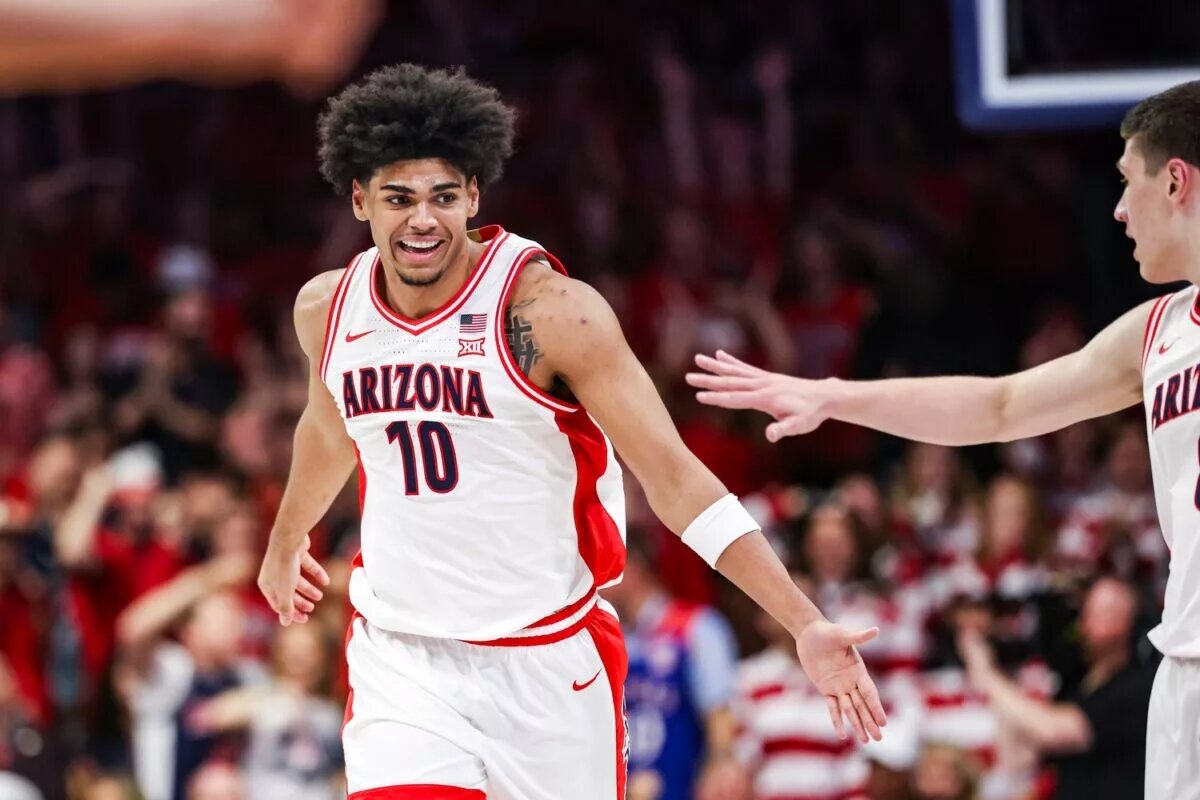 Arizona Wildcats forward Koa Peat (10) celebrates during the first half of the game against the Kansas Jayhawks at McKale Memorial Center.