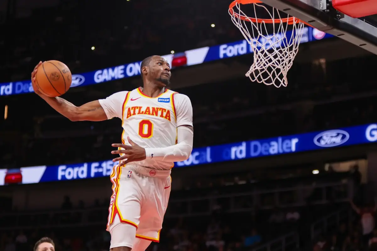 Mar 1, 2026; Atlanta, Georgia, USA; Atlanta Hawks forward Jonathan Kuminga (0) dunks against the Portland Trail Blazers in the fourth quarter at State Farm Arena. Mandatory Credit: Brett Davis-Imagn Images