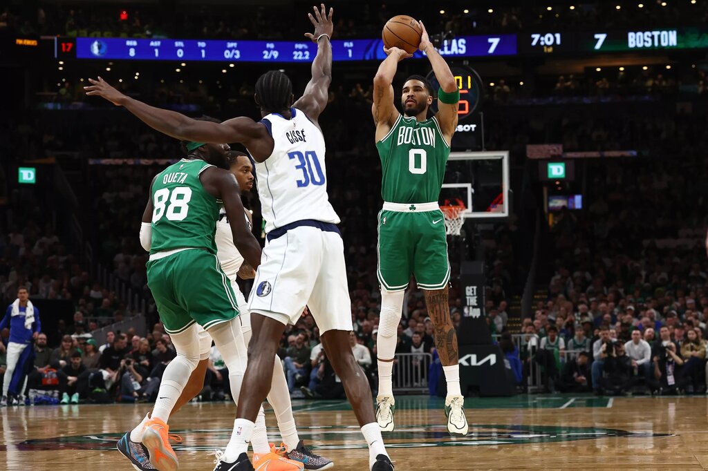 Mar 6, 2026; Boston, Massachusetts, USA; Boston Celtics forward Jayson Tatum (0) shoots during the first quarter against the Dallas Mavericks at TD Garden. Mandatory Credit: Winslow Townson-Imagn Images