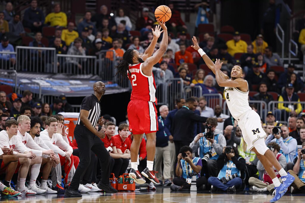 Ohio State Buckeyes guard Bruce Thornton (2) shoots against Michigan Wolverines guard Nimari Burnett (4) during the second half at United Center. Mandatory Credit: Kamil Krzaczynski-Imagn Images