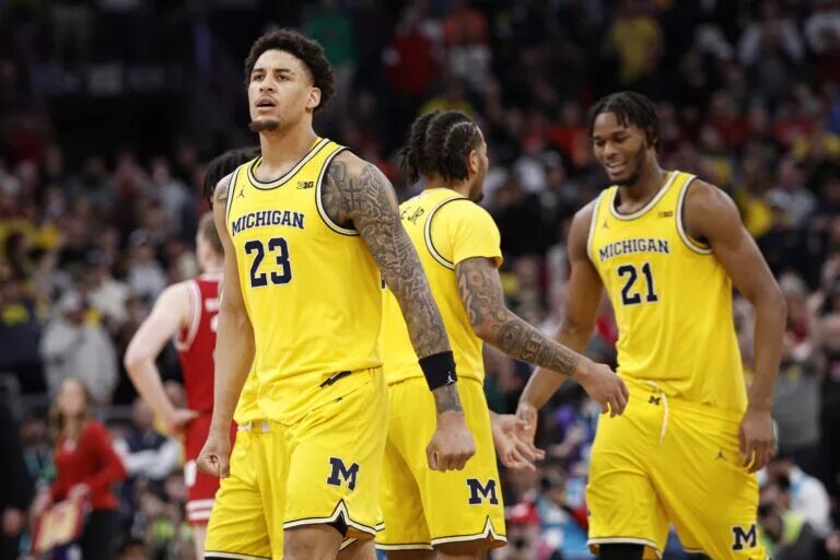 Michigan Wolverines forward Yaxel Lendeborg (23) reacts after scoring a game-winning basket against the Wisconsin Badgers during the second half at United Center.