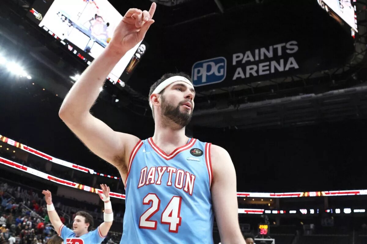 Mar 14, 2026; Pittsburgh, PA, USA; Dayton Flyers forward Jacob Conner (24) reacts after defeating the Saint Louis Billikens in an Atlantic 10 Conference Tournament Semifinal game at PPG Paints Arena. Mandatory Credit: Charles LeClaire-Imagn Images