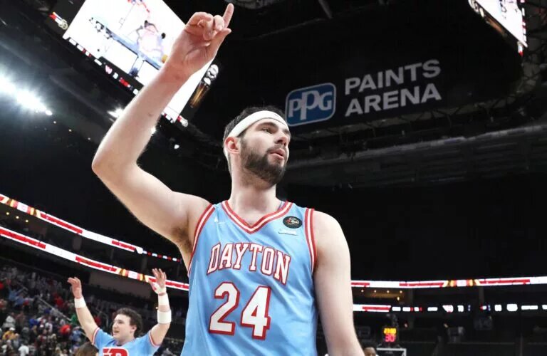 Dayton Flyers forward Jacob Conner (24) reacts after defeating the Saint Louis Billikens in an Atlantic 10 Conference Tournament Semifinal game at PPG Paints Arena.
