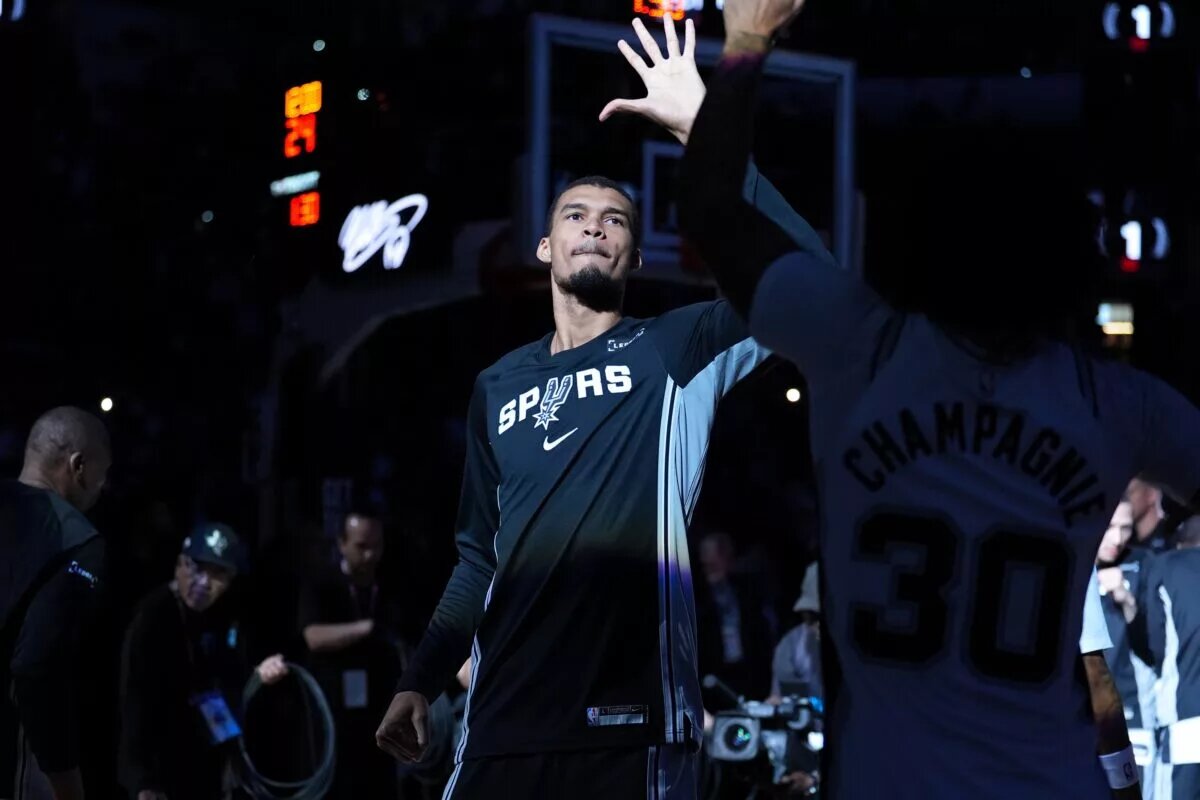Mar 14, 2026; San Antonio, Texas, USA; San Antonio Spurs forward Victor Wembanyama (1) is introduced before the game against the Charlotte Hornets at Frost Bank Center. Mandatory Credit: Daniel Dunn-Imagn Images