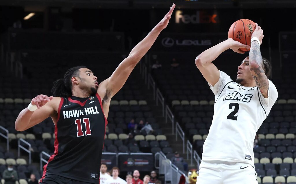 VCU Rams forward Jadrian Tracey (2) shoots against Saint Joseph's Hawks guard Jaiden Glover-Toscano (11) during the second halfin an Atlantic 10 Conference Tournament semifinal game at PPG Paints Arena.