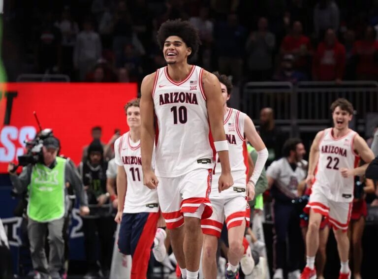 Arizona Wildcats forward Koa Peat (10) reacts after defeating the Houston Cougars during the men's Big 12 Conference Tournament Championship at T-Mobile Center.