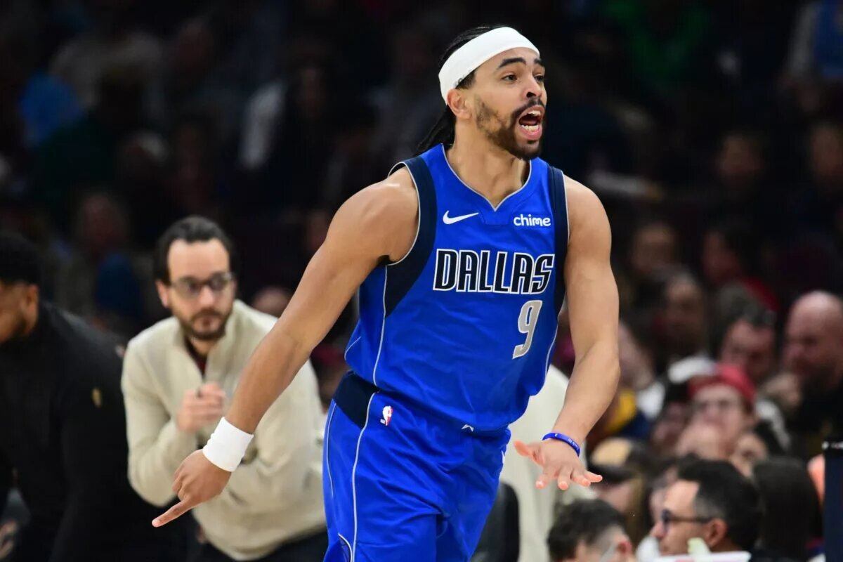 Mar 15, 2026; Cleveland, Ohio, USA; Dallas Mavericks guard Ryan Nembhard (9) celebrates after hitting a three point basket against the Cleveland Cavaliers during the second half at Rocket Arena. Mandatory Credit: Ken Blaze-Imagn Images