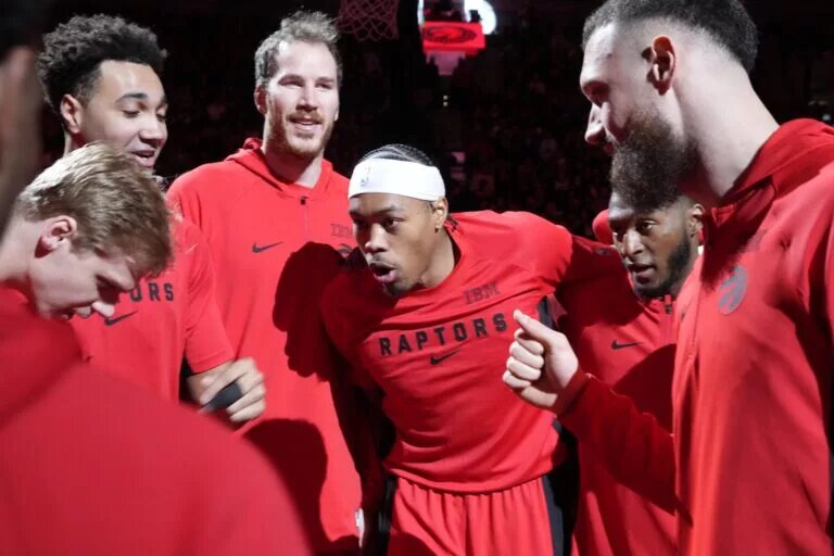 Mar 15, 2026; Toronto, Ontario, CAN; Toronto Raptors guard Scottie Barnes (center) huddles up with teammates before the start of the game against the Detroit Pistons at Scotiabank Arena. Mandatory Credit: John E. Sokolowski-Imagn Images