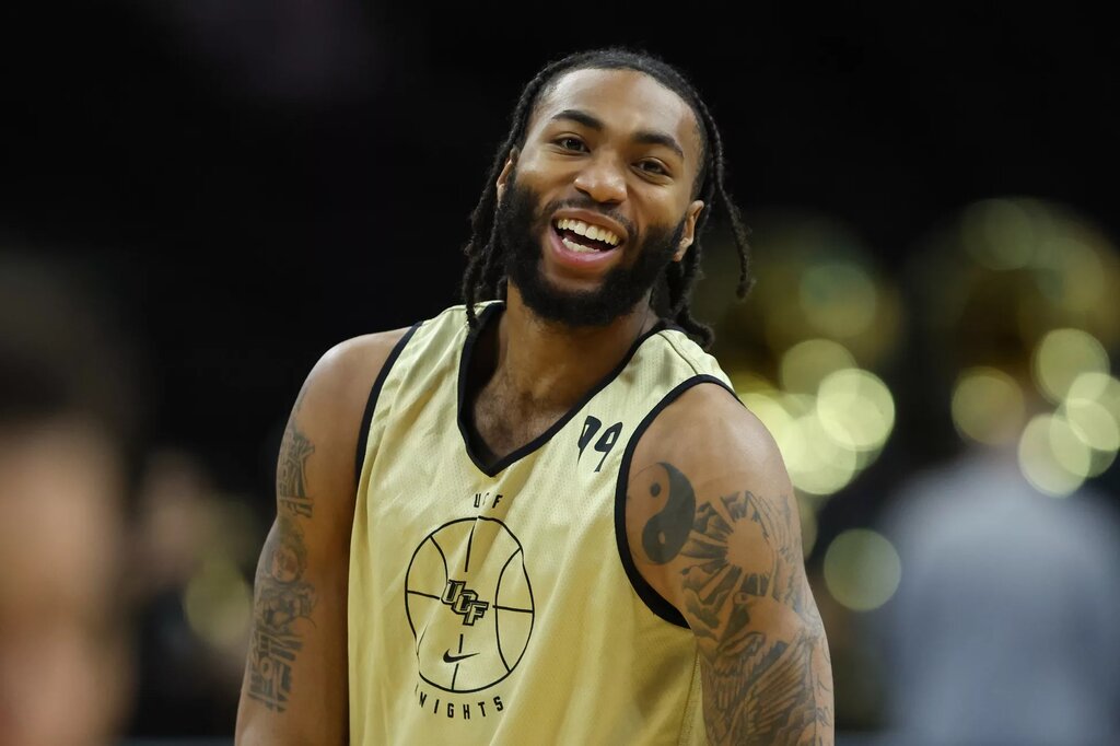 UCF Knights forward Jordan Burks (99) reacts during a practice session ahead of the first round of the men's 2026 NCAA Tournament at Xfinity Mobile Arena.
