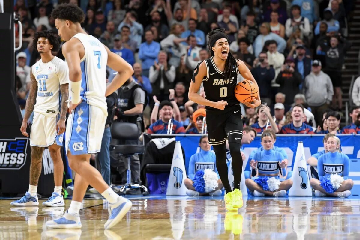 VCU Rams guard Brandon Jennings (0) celebrates as the game ends Thursday, March 19, 2026, after the NCAA Men’s Basketball Tournament first round game against the North Carolina Tar Heels at Bon Secours Wellness Arena in Greenville, South Carolina. VCU Rams won 82-78 in OT.