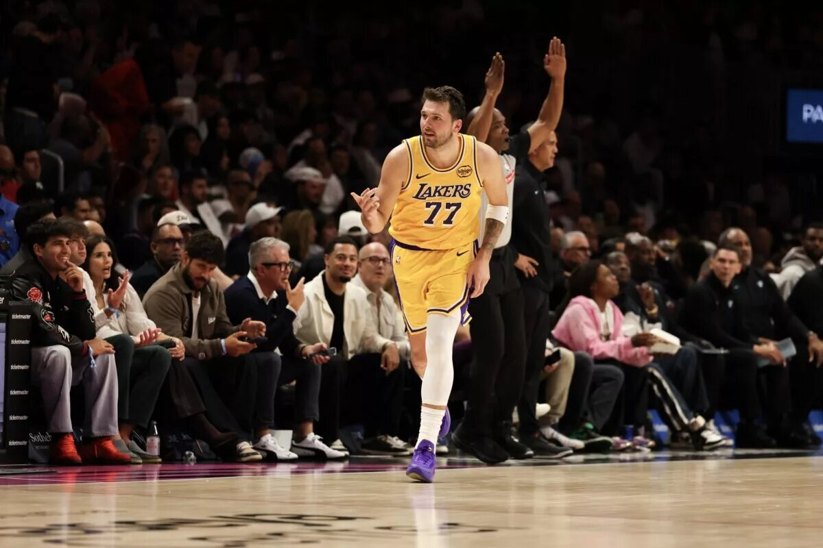 Mar 19, 2026; Miami, Florida, USA; Los Angeles Lakers guard Luka Doncic (77) reacts against the Miami Heat during the second half at Kaseya Center. Mandatory Credit: Isabella Frias-Imagn Images