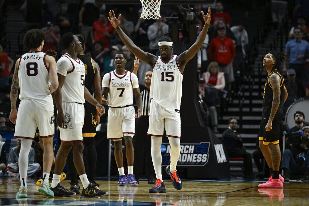 Mar 19, 2026; Portland, OR, USA; Gonzaga Bulldogs forward Graham Ike (15) reacts after defeating the Kennesaw State Owls during a first round game of the men's 2026 NCAA Tournament at Moda Center. Mandatory Credit: Troy Wayrynen-Imagn Images