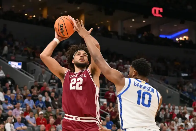 Mar 20, 2026; St. Louis, MO, USA; Santa Clara Broncos forward Allen Graves (22) shoots the ball against Kentucky Wildcats forward Brandon Garrison (10) during the first half of a first round game of the men's 2026 NCAA Tournament at Enterprise Center. Mandatory Credit: Jeff Curry-Imagn Images