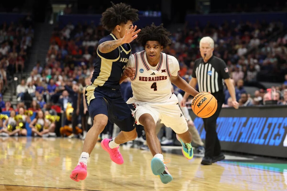 Mar 20, 2026; Tampa, FL, USA; Texas Tech Red Raiders guard Christian Anderson (4) drives against Akron Zips guard Sharron Young (3) in the second half during a first round game of the men's 2026 NCAA Tournament at Benchmark International Arena. Mandatory Credit: Nathan Ray Seebeck-Imagn Images