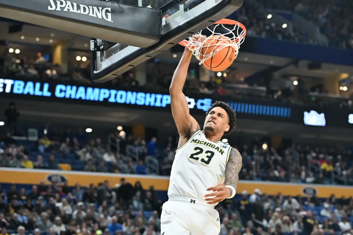 Mar 21, 2026; Buffalo, NY, USA; Michigan Wolverines forward Yaxel Lendeborg (23) dunks the ball in the second half against the Saint Louis Billikens during a second round game of the men's 2026 NCAA Tournament at Keybank Center. Mandatory Credit: Mark Konezny-Imagn Images