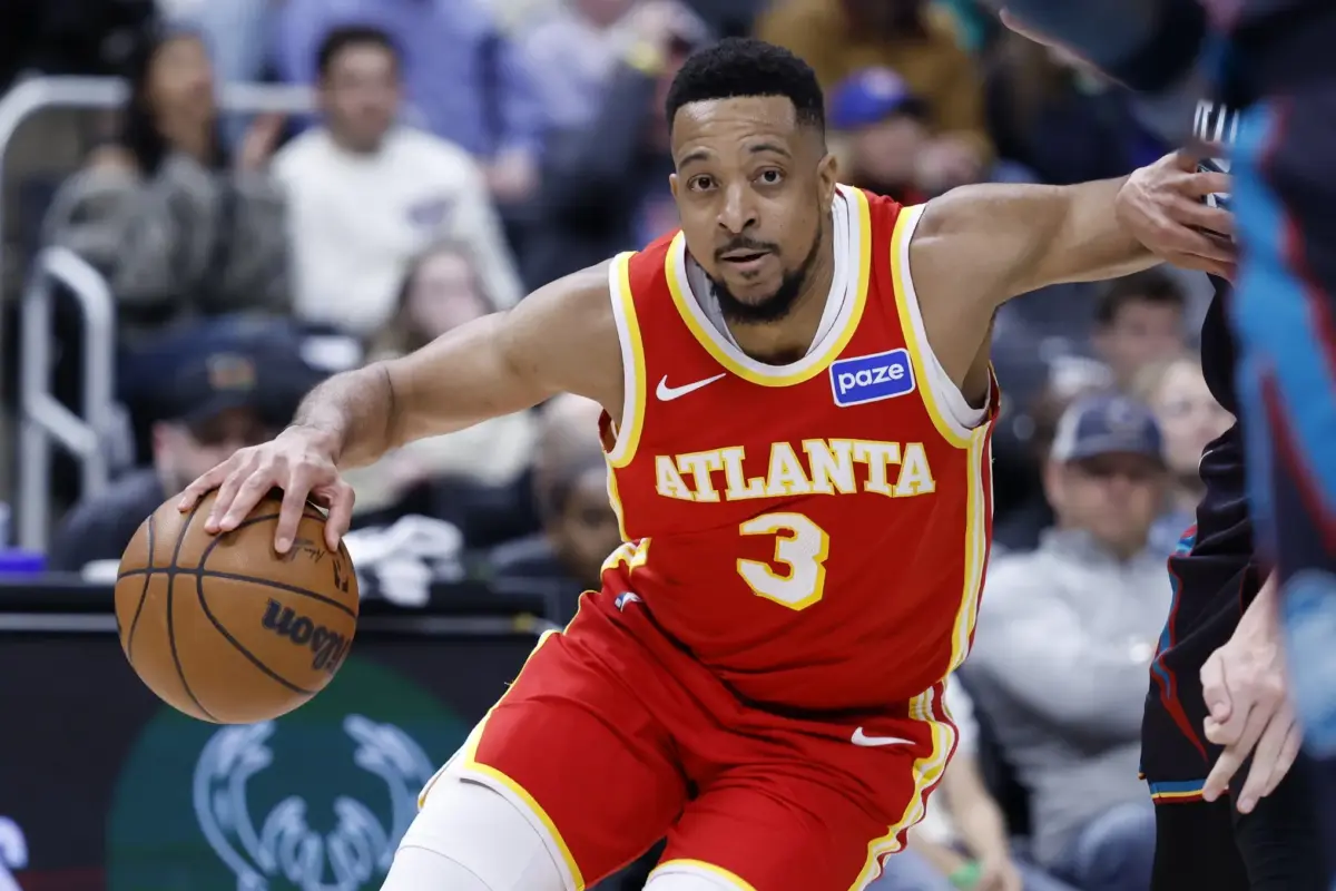 Mar 25, 2026; Detroit, Michigan, USA; Atlanta Hawks guard CJ McCollum (3) dribbles in the second half against the Detroit Pistons at Little Caesars Arena. Mandatory Credit: Rick Osentoski-Imagn Images