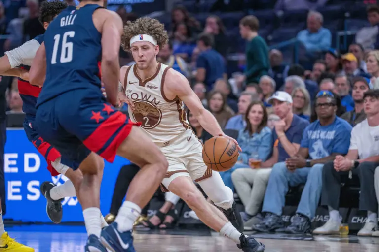 Golden State Warriors guard Brandin Podziemski (2) drives against Washington Wizards forward Anthony Gill (16) during the third quarter at Chase Center.
