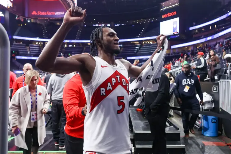 oronto Raptors guard Immanuel Quickley (5) reacts after a victory over the Atlanta Hawks at State Farm Arena.