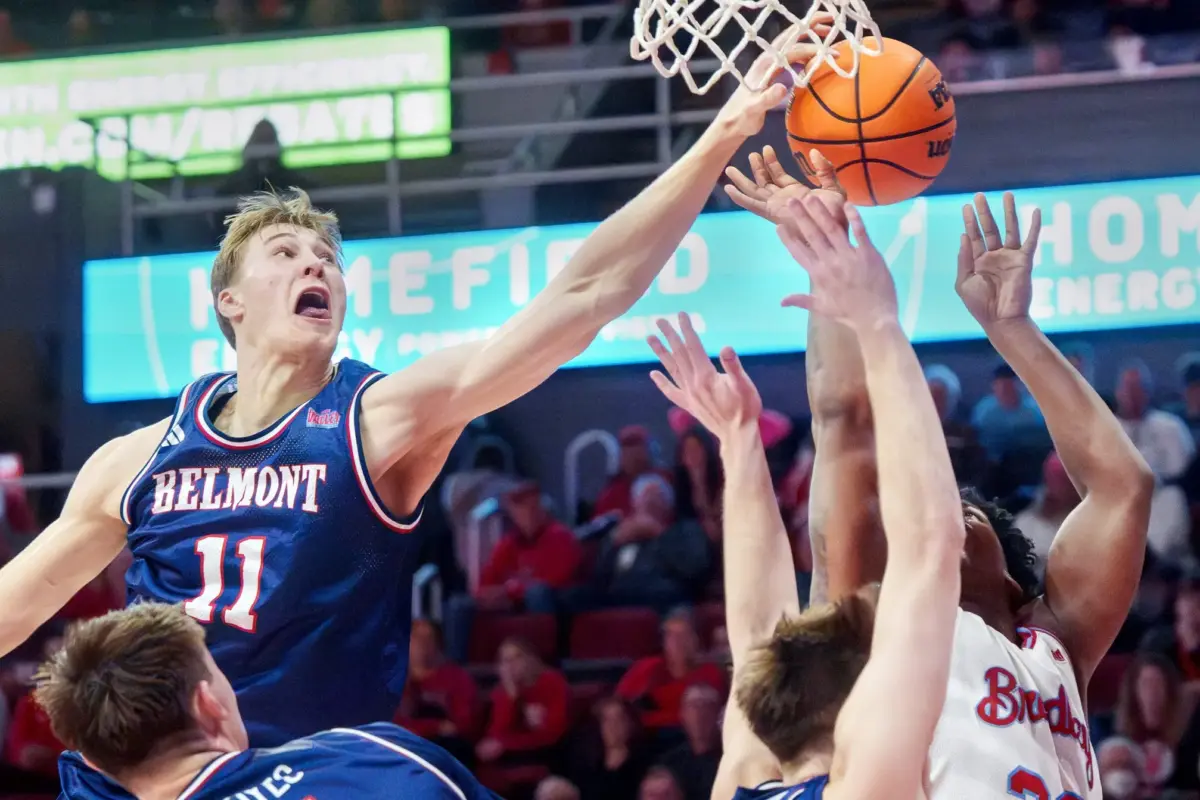 Belmont's Drew Scharnowski (11) blocks a shot by Bradley's Jaquan Johnson in the second half of their college basketball game Monday, Feb. 9, 2026 at Carver Arena in Peoria. Johnson was fouled before the block. The Braves defeated the Bruins 95-84. © MATT DAYHOFF/JOURNAL STAR / USA TODAY NETWORK via Imagn Images