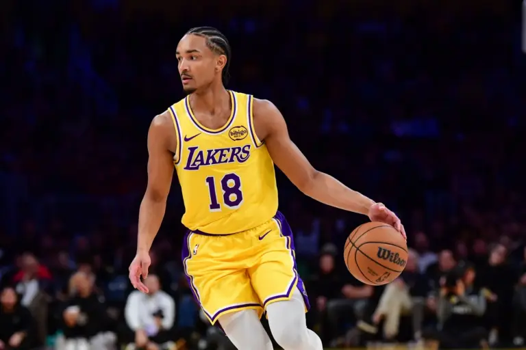 Feb 10, 2026; Los Angeles, California, USA; Los Angeles Lakers guard Kobe Bufkin (18) controls the ball against the San Antonio Spurs during the first half at Crypto.com Arena. Mandatory Credit: Gary A. Vasquez-Imagn Images