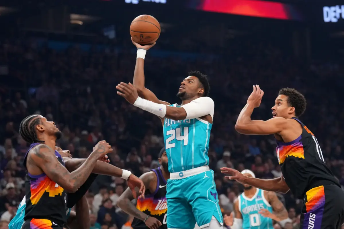 Mar 8, 2026; Phoenix, Arizona, USA; Charlotte Hornets forward Brandon Miller (24) shoots against the Phoenix Suns during the first half at Mortgage Matchup Center. Mandatory Credit: Joe Camporeale-Imagn Images