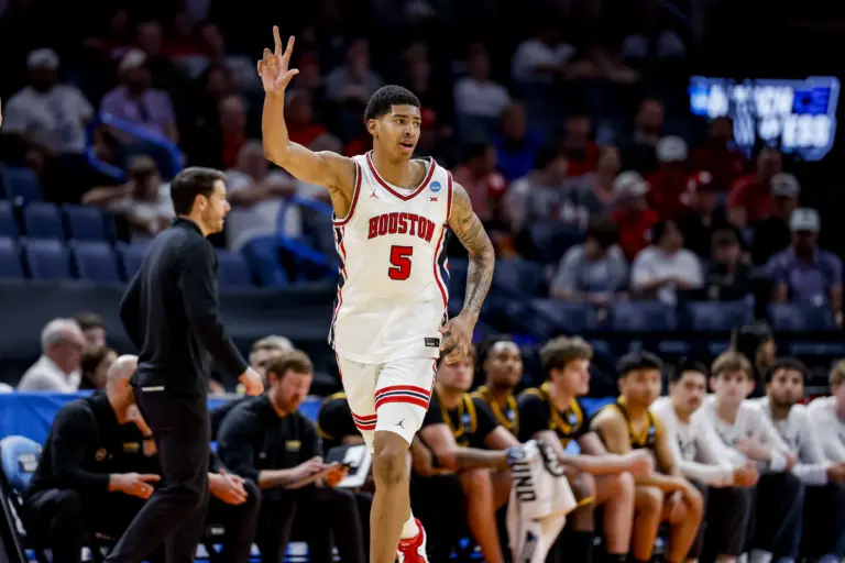 Houston Cougars center Chris Cenac Jr. (5) signals to his team during a first round game of the men's 2026 NCAA Tournament at Paycom Center.