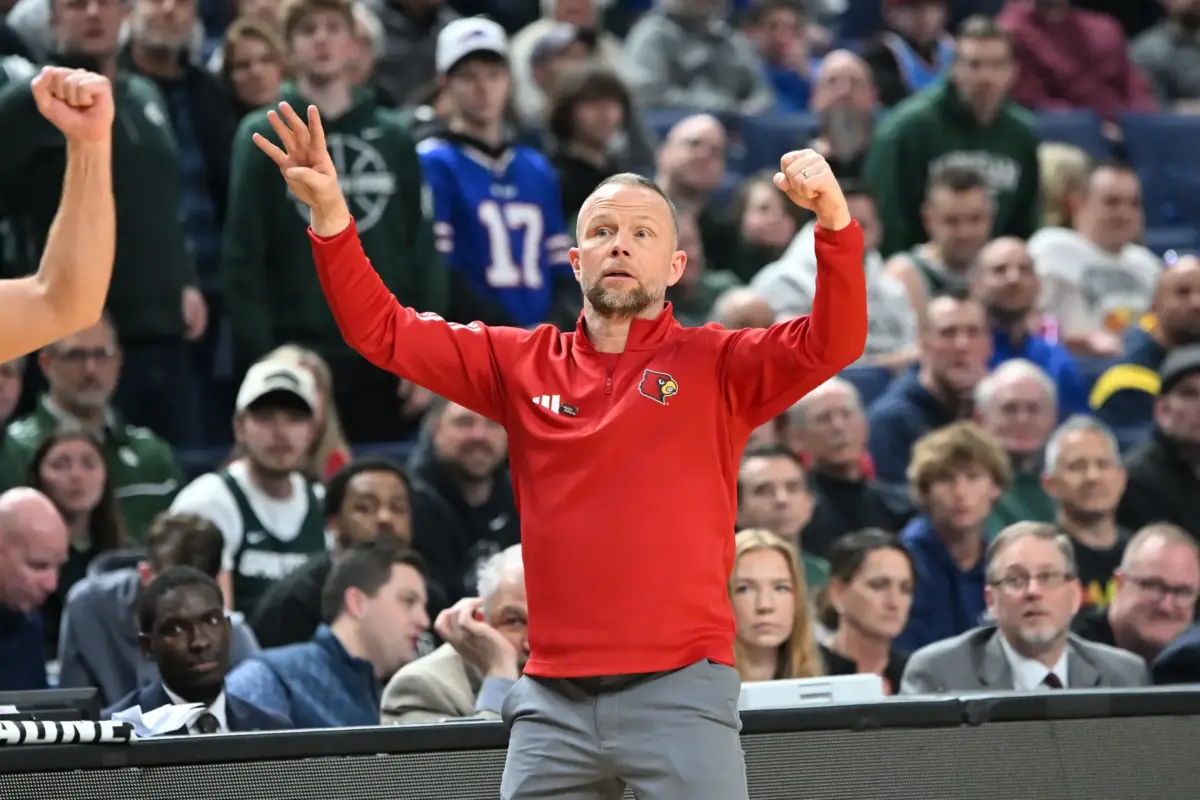 Mar 21, 2026; Buffalo, NY, USA; Louisville Cardinals head coach Pat Kelsey reacts in the second half against the Michigan State Spartans during a second round game of the men's 2026 NCAA Tournament at Keybank Center. Mandatory Credit: Mark Konezny-Imagn Images