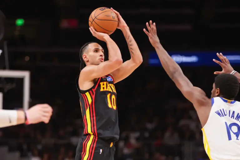 Mar 21, 2026; Atlanta, Georgia, USA; Atlanta Hawks forward Zaccharie Risacher (10) shoots against the Golden State Warriors in the second quarter at State Farm Arena. Mandatory Credit: Brett Davis-Imagn Images