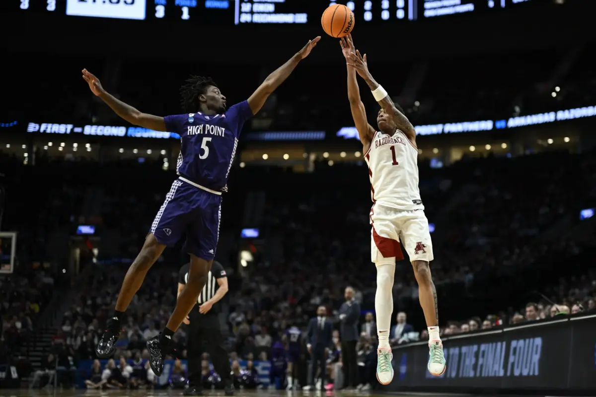 2026 NBA Draft prospect Meleek Thomas (Arkansas Razorbacks) takes a 3 against a High Point defender