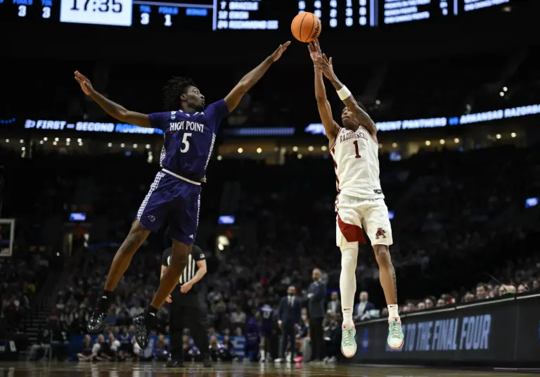 2026 NBA Draft prospect Meleek Thomas (Arkansas Razorbacks) takes a 3 against a High Point defender