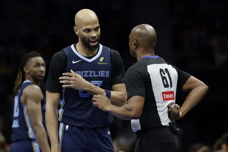 Mar 21, 2026; Charlotte, North Carolina, USA; Memphis Grizzlies forward Taj Gibson (67) discusses a call with referee Courtney Kirkland (61) during the second half against the Charlotte Hornets at Spectrum Center. Mandatory Credit: Brian Westerholt-Imagn Images