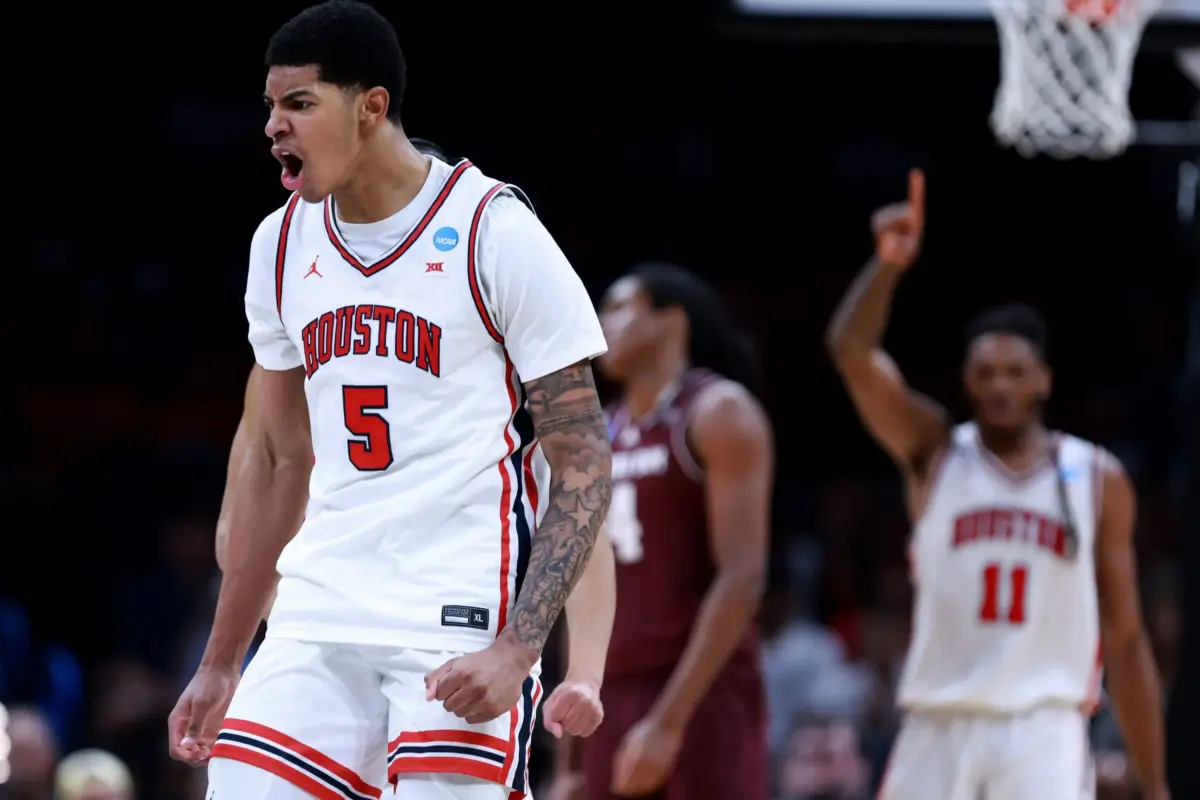 Houston's Chris Cenac Jr. (5) cheers during a second-round game in the NCAA men's basketball tournament between Houston Cougars and Texas A&M Aggies at Paycom Center in Oklahoma City, Saturday March 21, 2026.