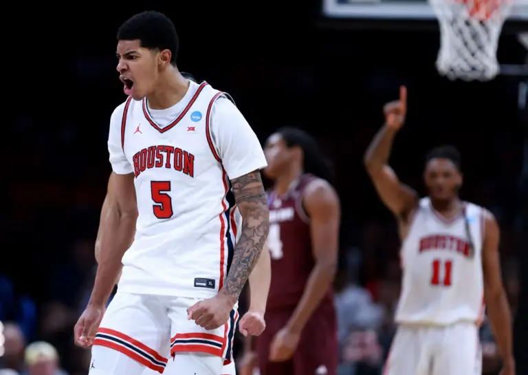 Houston's Chris Cenac Jr. (5) cheers during a second-round game in the NCAA men's basketball tournament between Houston Cougars and Texas A&M Aggies at Paycom Center in Oklahoma City, Saturday March 21, 2026.