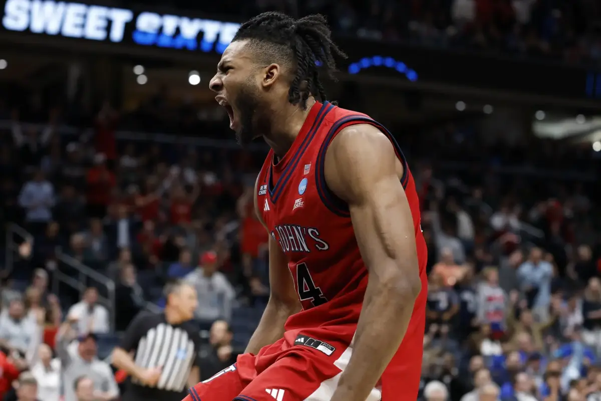 Mar 27, 2026; Washington, DC, USA; St. John's Red Storm forward Zuby Ejiofor (24) reacts after a dunk against the Duke Blue Devils in the second half during a Sweet Sixteen game of the East Regional of the men's 2026 NCAA Tournament at Capital One Arena. Mandatory Credit: Amber Searls-Imagn Images